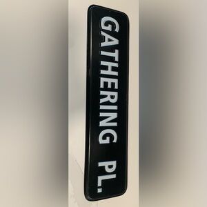 “GATHERING PL.” metal sign